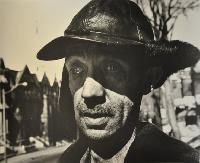 Arnold; Janitor in Nina's Building