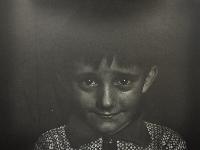 Boy with Mild Smile