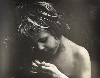 Claudia Examining Something
