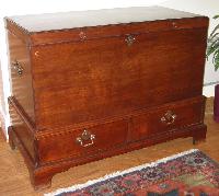 Mahogany mule chest on bracket feet with 2 drawers