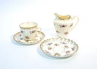 Creamer; Saucers; Teacup