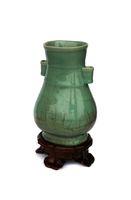 Untitled (Celedon Covered Vase with Lotus Decor)