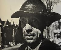 Arnold; Janitor in Nina's Building