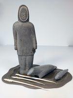 Person with Seal, Fish and Spears