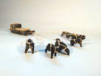 Stone Sled with Dogs