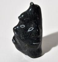 Untitled (Carved Faces)