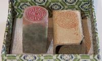Green-patterned box with stone seal and leather cover