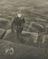 Man in Scuba Gear with Rod