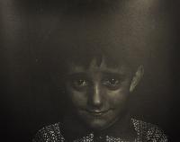 Boy with Mild Smile