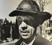 Arnold; Janitor in Nina's Building