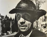 Arnold; Janitor in Nina's Building